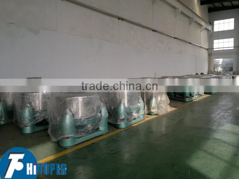 Top discharge filter centrifuge separator for liquid-solid separation
