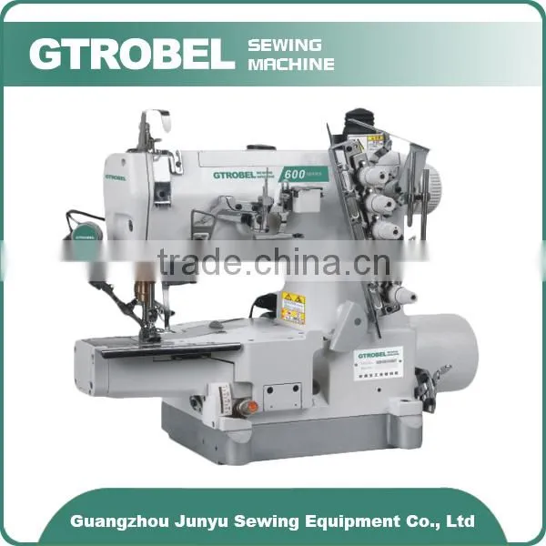 Knitwear sewing machine with dry head sewing machine