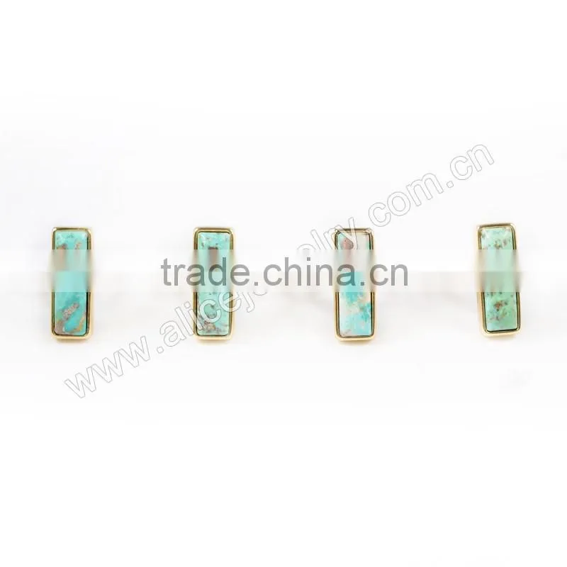 Natural blue turquoise set into a 18k gold bezel