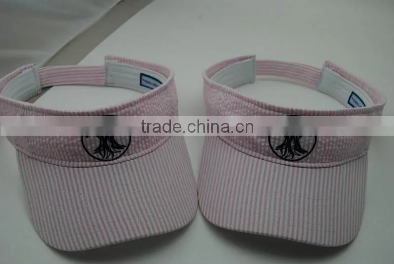 white and pink curved brim sun visor cap