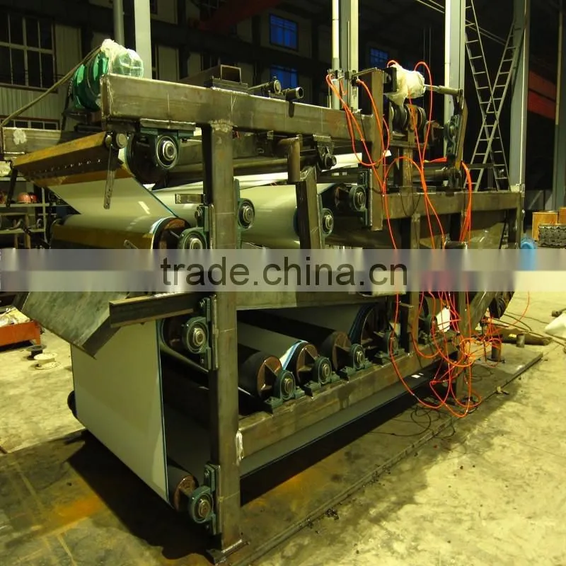 High efficiency sludge dewatering belt press