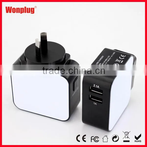 2 port USB multi use mobile phone home charger with 4 interchangeable EU US UK AU plug