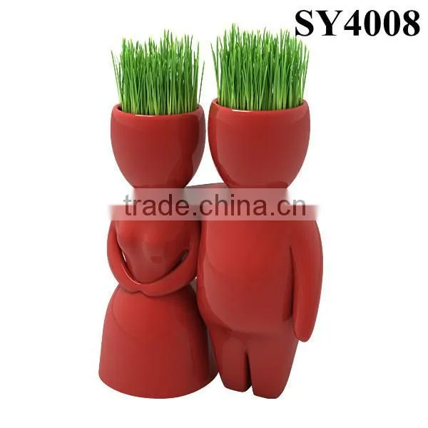 With grass hair white man growing grass doll