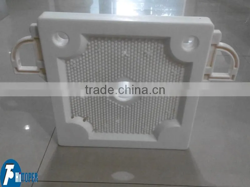 Filter press plate used in the dewatering treatment of water purification