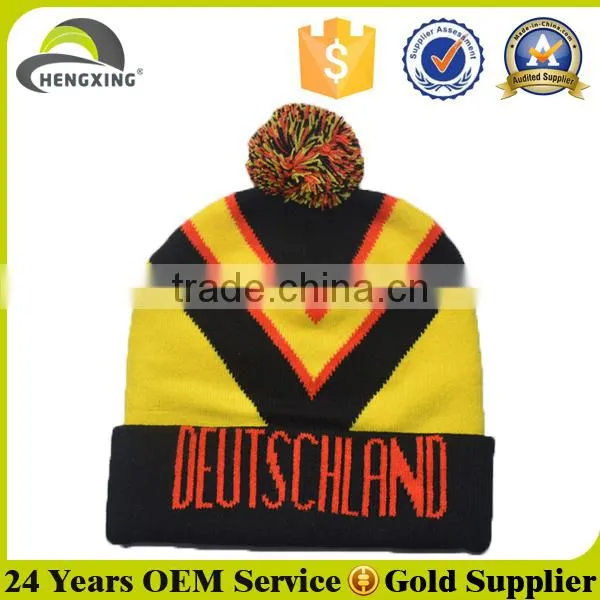 Knitted embrodiery hat with pom ball