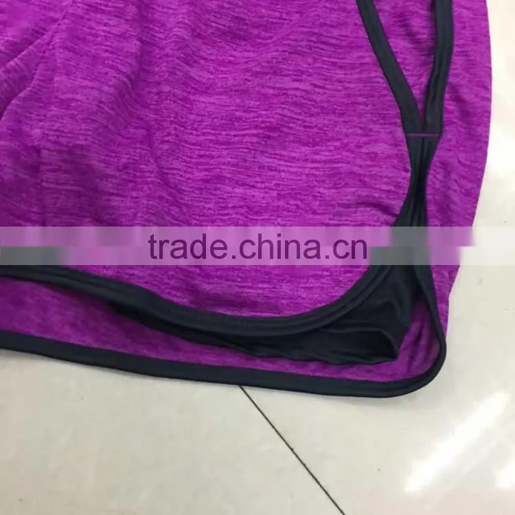 China garment stock lot factory price women cheap gym shorts