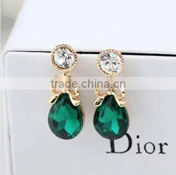 Ruby earrings, noble earrings. Simulation of diamond earrings