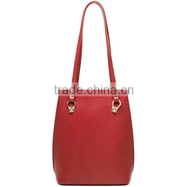 Multipurpose leather bag convert to a backpack from a shoulder bag