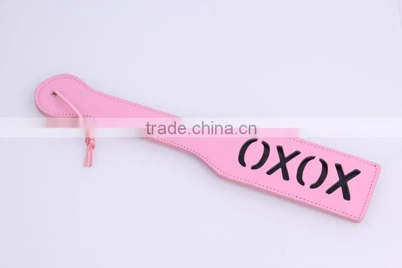 XOXO sex paddle, slut couple toy and paddles