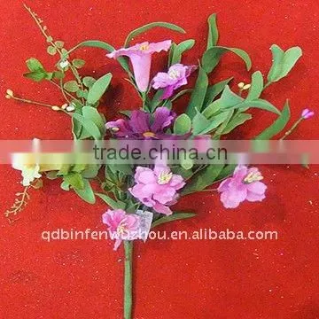 An Attractive Mixed Flowers Bush in Shades of Pink Yellow and Cream,mixed flowers bush