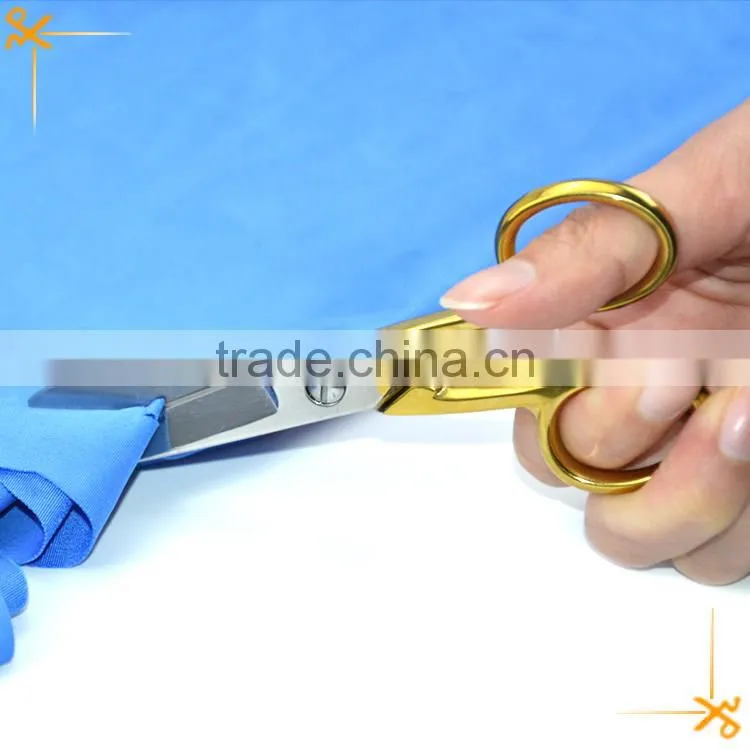 Full stainless steel scissors with gold-plating handle