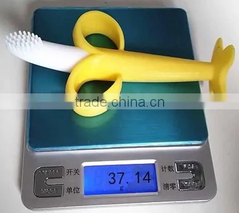OEM stand up banana shape baby silicone teether pacifier baby teether brush