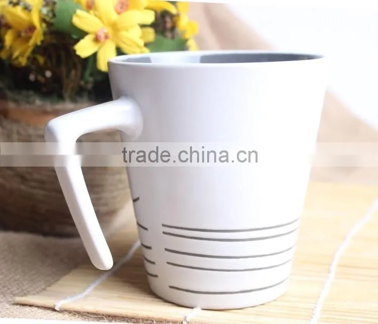 High quality stoneware tea mug with unique handle from china