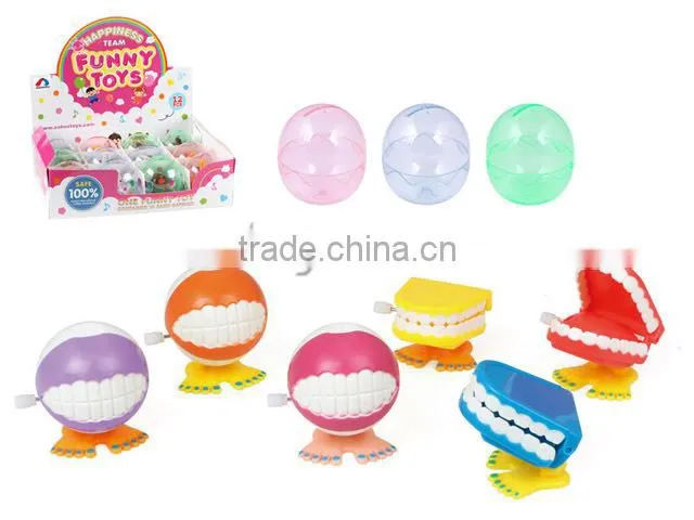 Hot Selling Super Funny Jump Teeth Plastic Wind Up Toys