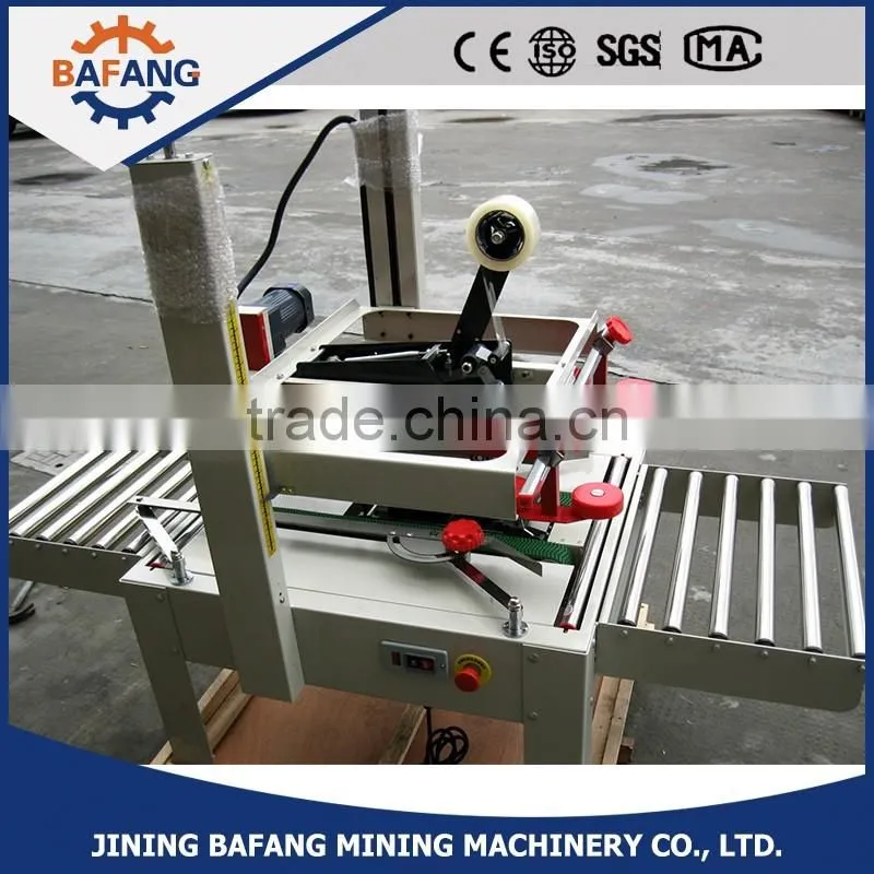Semi-auto boxes sealing strapping machine