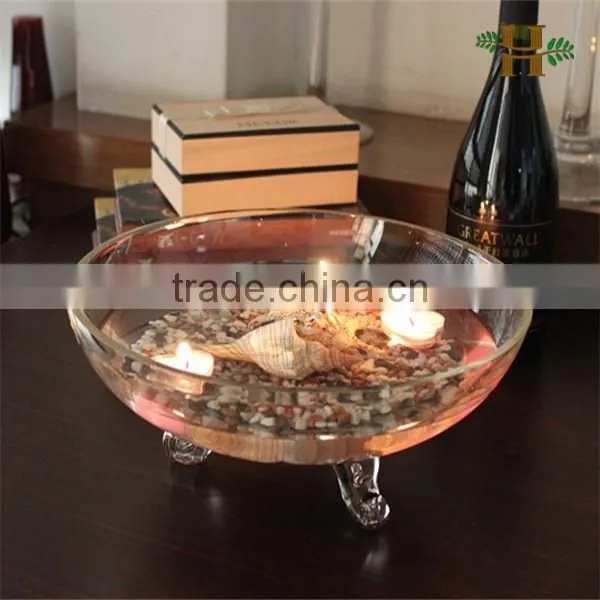 Handmade footed large glass jar with food arrangement