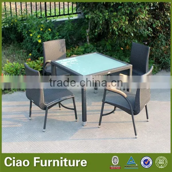 Stackable rattan chair with plastic wood arm