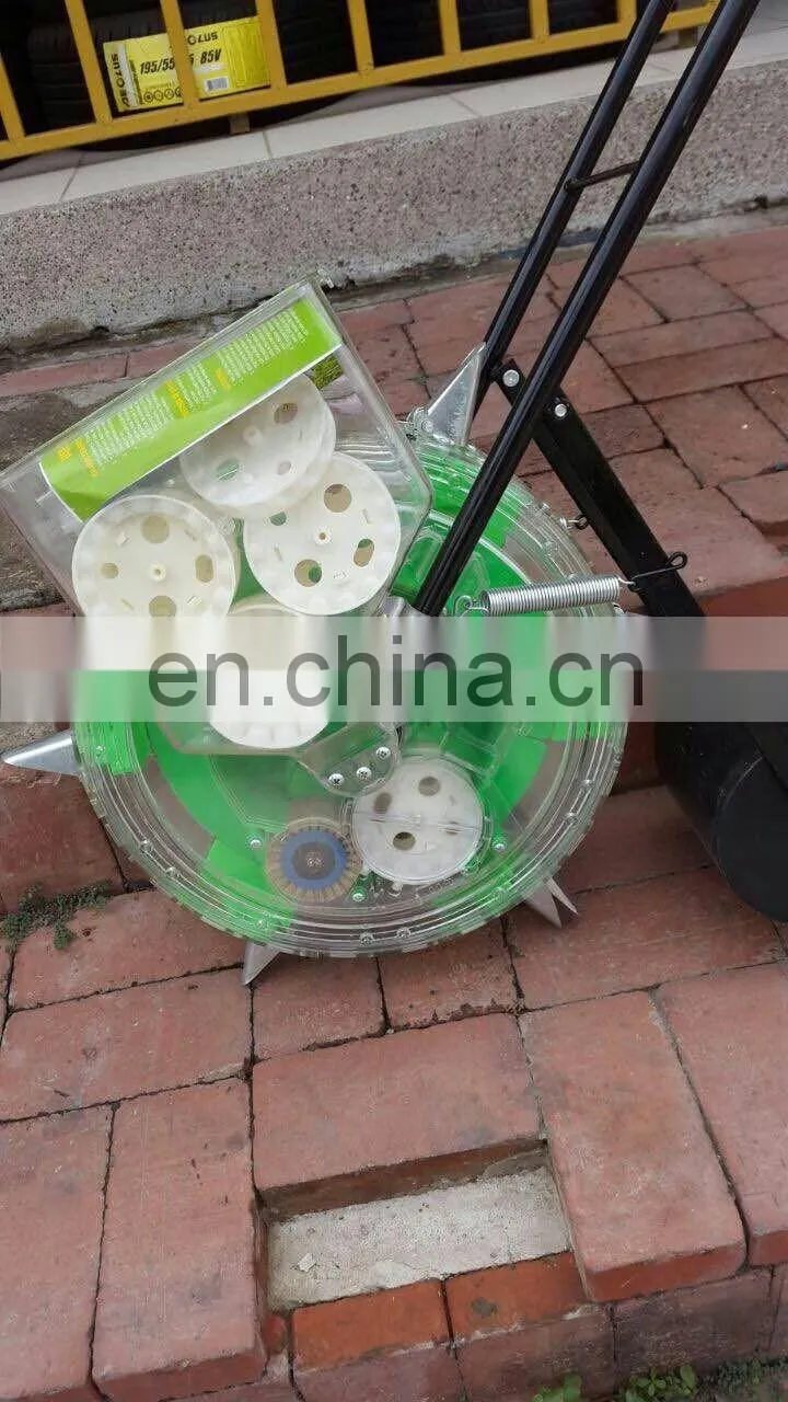 Double barrel hand push seeder HX-A038