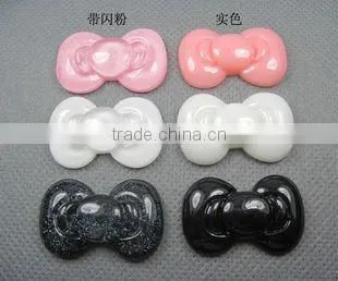 Hot sale flat back resins bow for jewelry or phone decoration