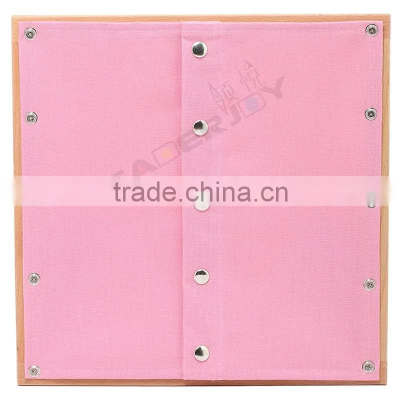 Montessori-snap closure dressing frame