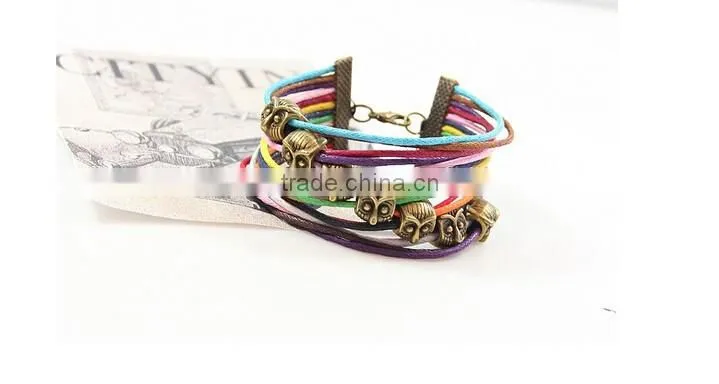>>hot selling cute promotional colorful multi strands cord owl bracelet/