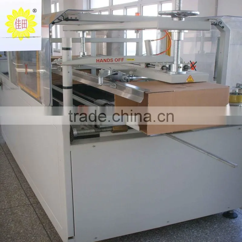 Full automatic carton erector with bottom sealer