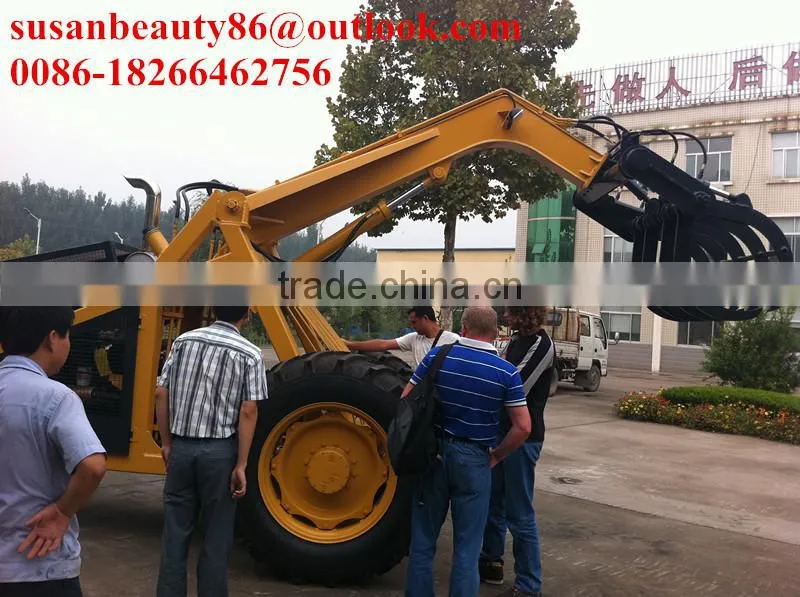 Small wheel loader with sugarcane grasper