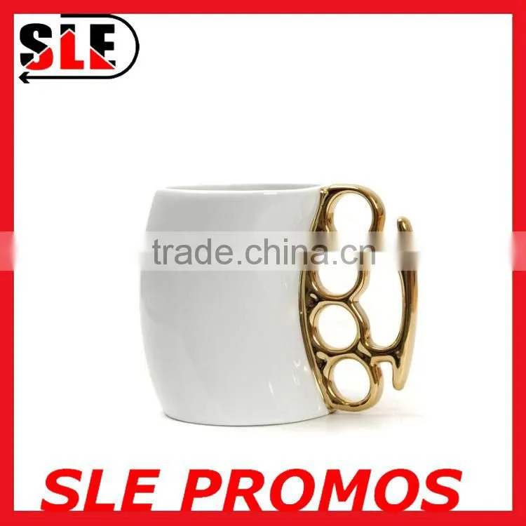 Hot Sale New Product Design Wholesale Ceramic Fist Cup,Brass Knuckle Duster Handle Coffee Milk Mug Cup Cool Gift Promotional AD
