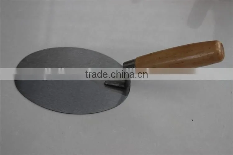 Bricklaying trowel with carbon steel blade / construction tools