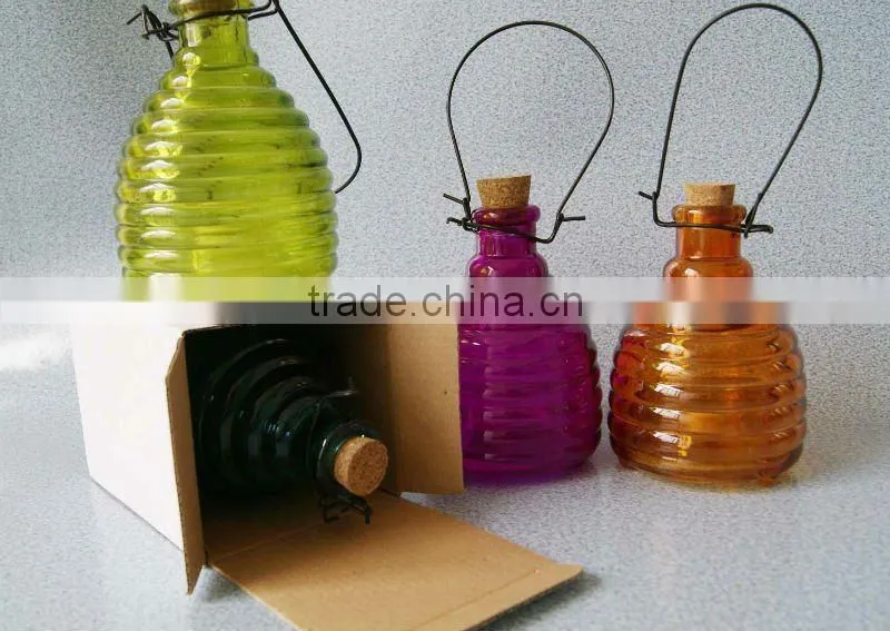 colored glass bee catcher with soft wood lid