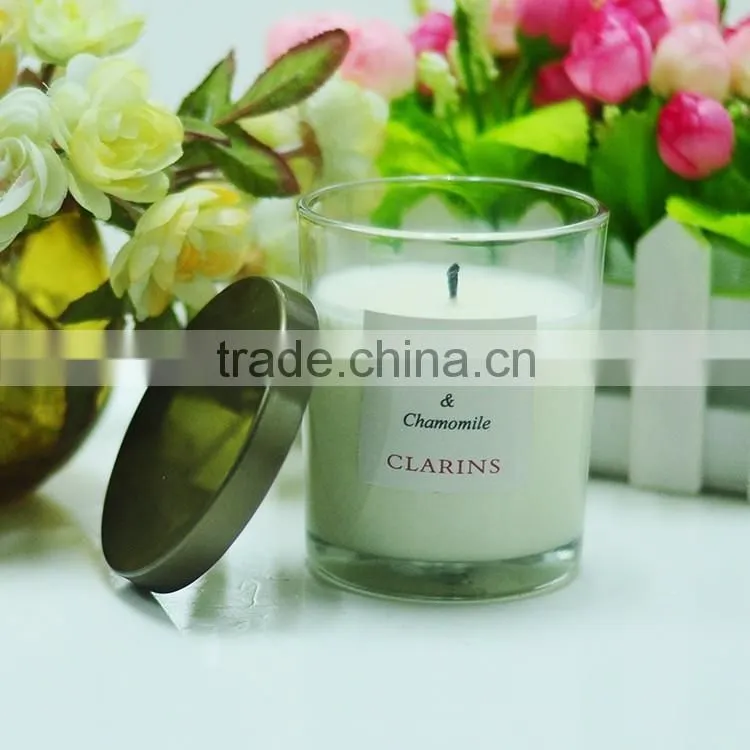 4 wicks scented candle in glass jar with metal lid