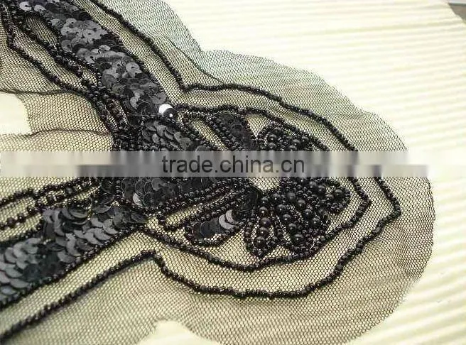 Handmade beaded appliques design of neck of suit