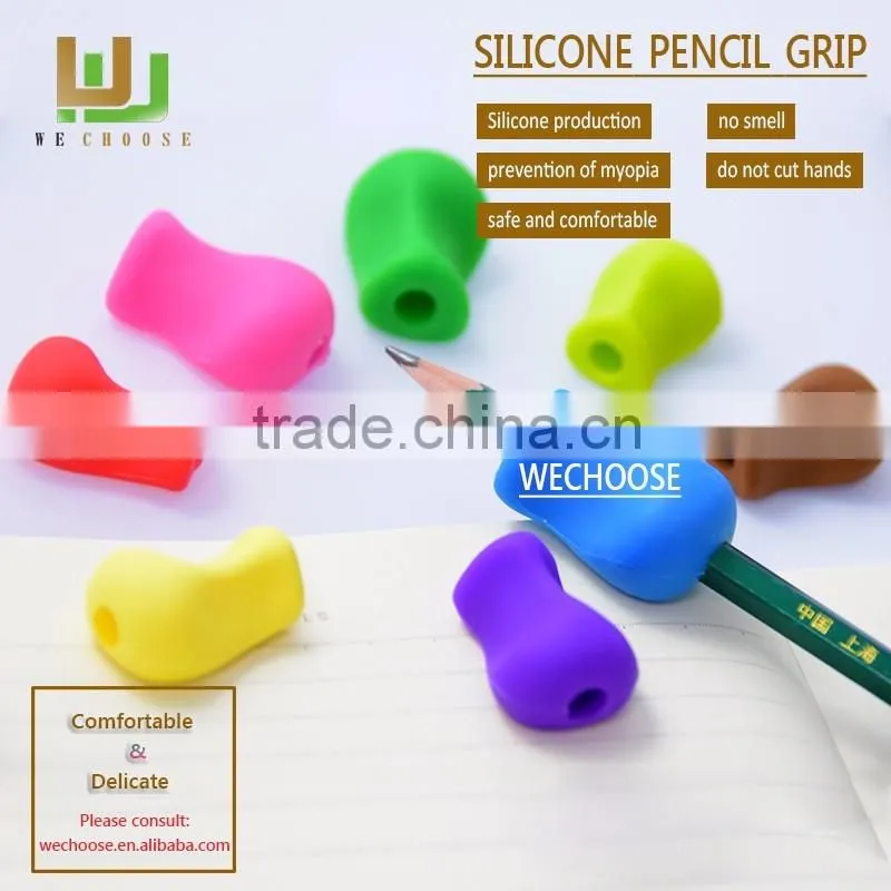 Wholesale silicone pencil grip between index and middle finger aimed at correcting children hold a pen comfortable ly