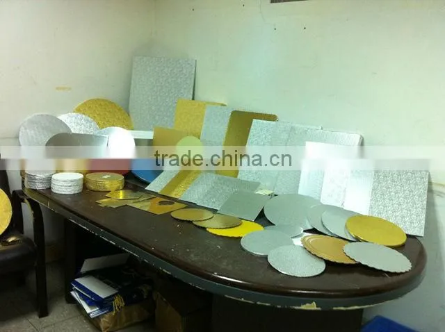 Gold foil embossed cake boards.