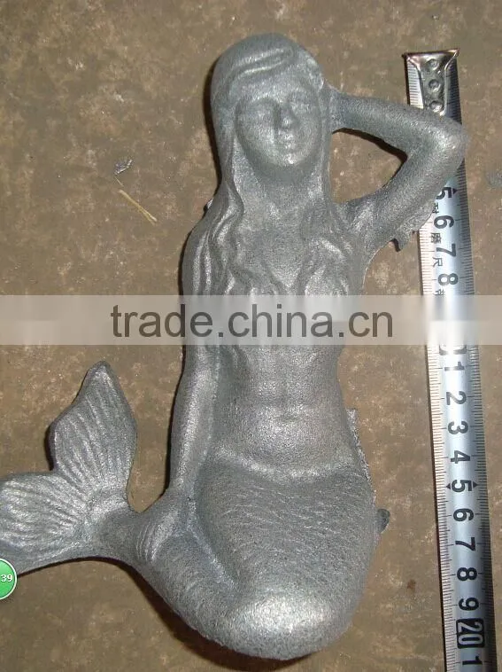 Cast iron mermaid statue