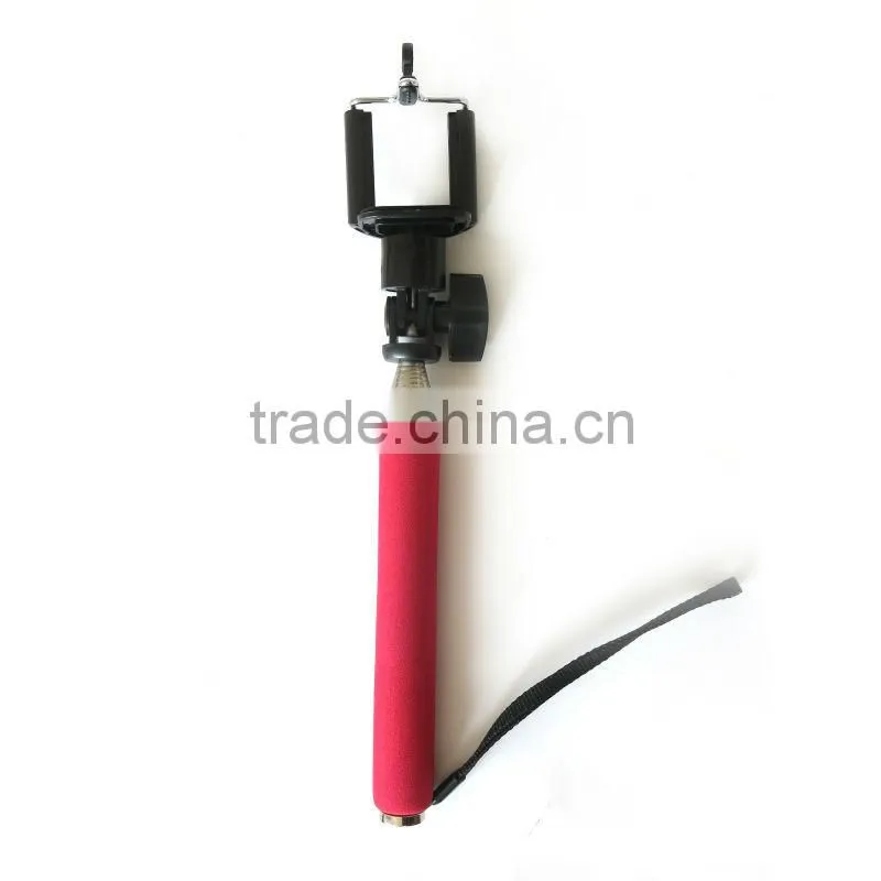 Handheld mobile phone monopod, handphone shutter controller / handphone clip / handheld monopod