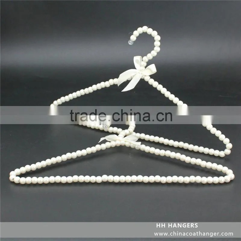 The HEAD metal clothes hanger with metal bar,metal top hanger,made in china