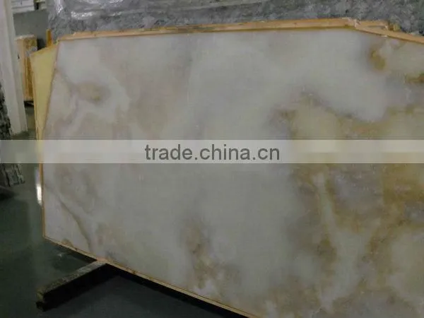 Red Onyx tile wholesaler price