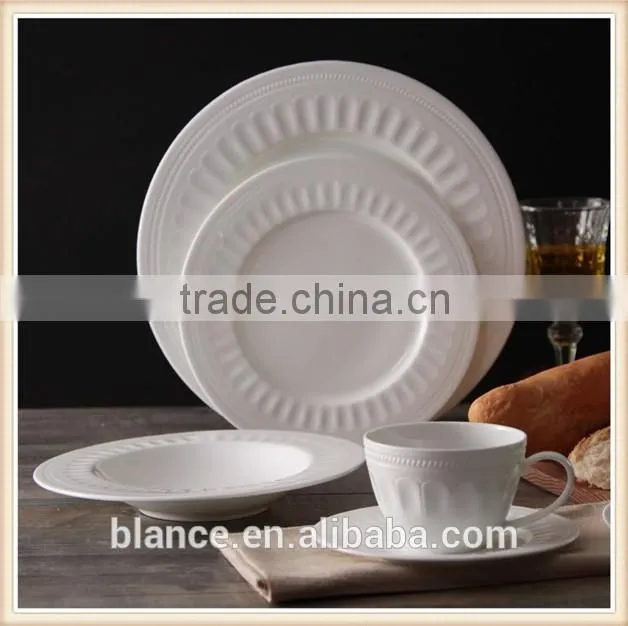 white ceramic European coffee cup set