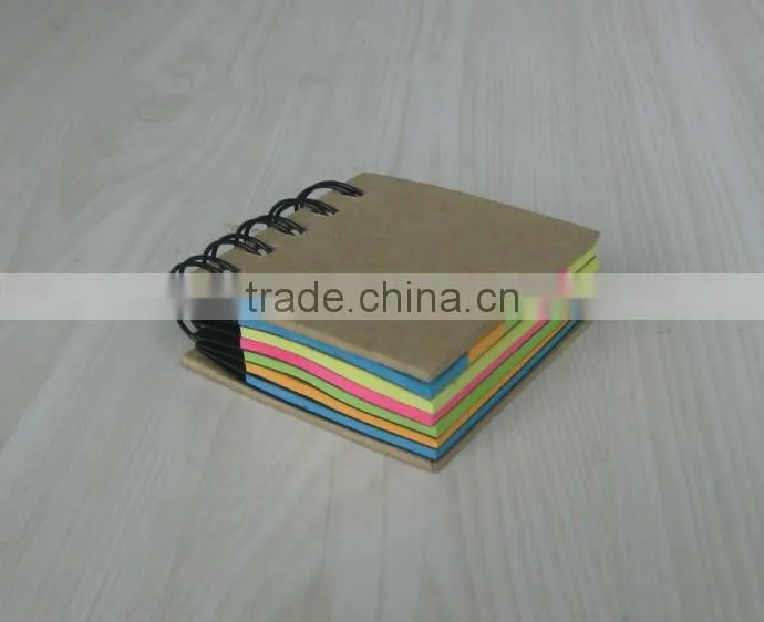 Mini spiral notebook with colorful noteflags