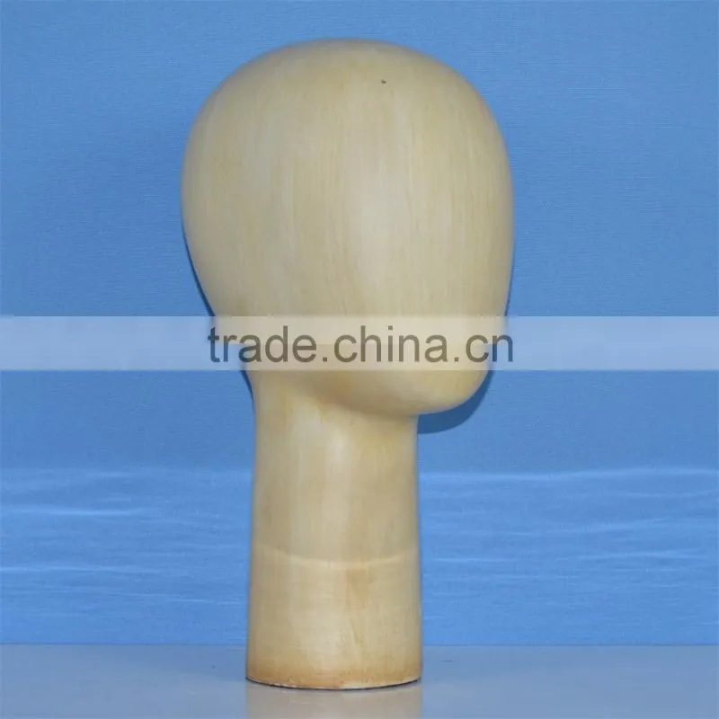 Abstract faceless wooden mannequin head for hat display