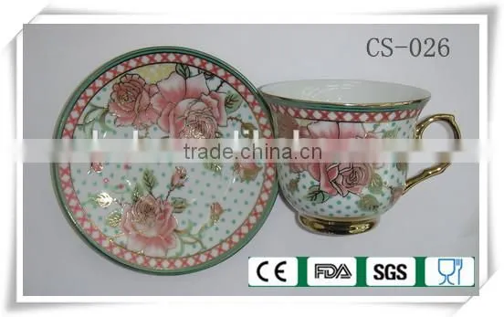 flower tea cup and saucer with gold rim