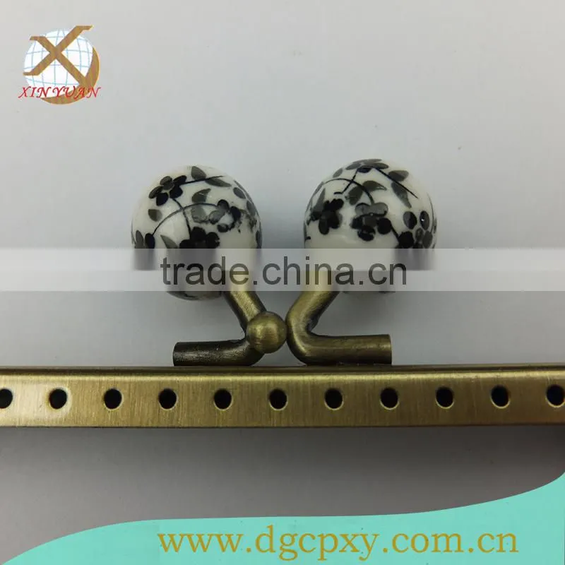 ceramic head metal frame for purse