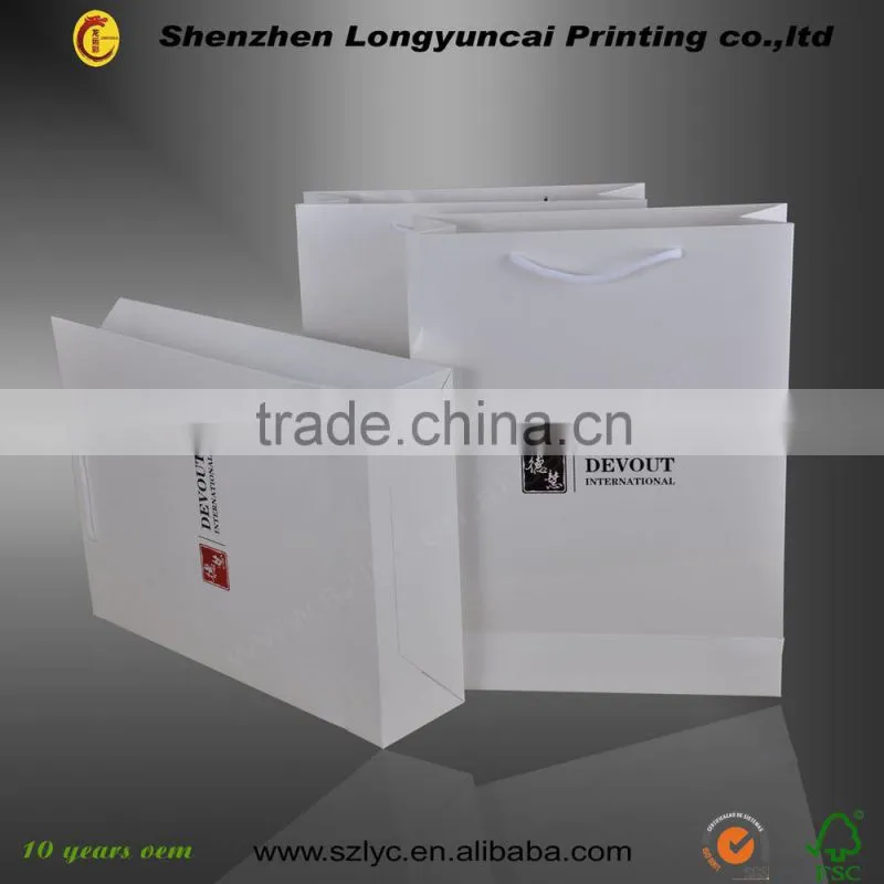 Low cost paper shopping bag printing factory in China