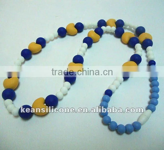 Salmon Orange Chew Silicone Teething Necklaces have a breakaway clasp Make by Food Grade Silicone