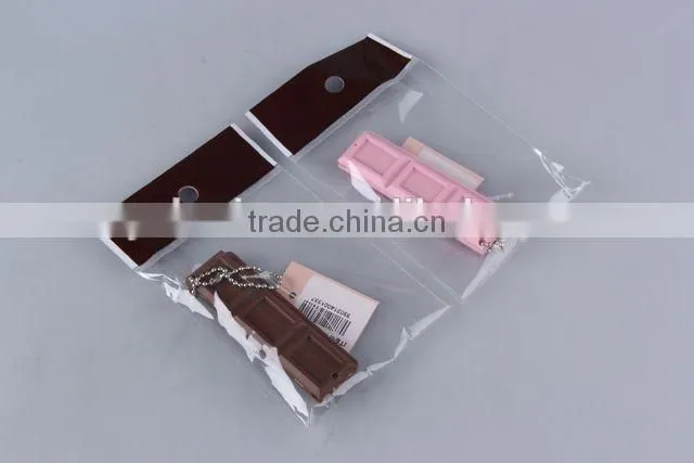 Chocolate shaped hair brush with hanging chain/folding comb