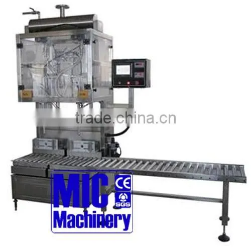 Micmachinery high quality liquid filler machine bottle filling system Weight metering type filling machine with CE approved