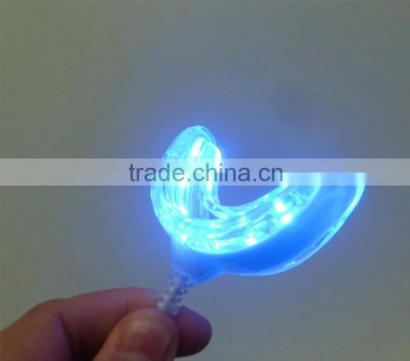 Datahero 16 LED cold light teeth whitening machine using on the phone