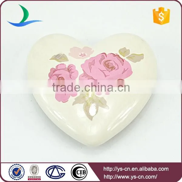white heart shape hanging with pink flower decal