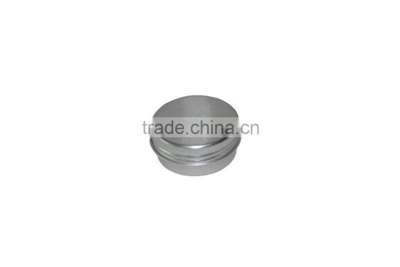 Small round tin box with clear window and screw